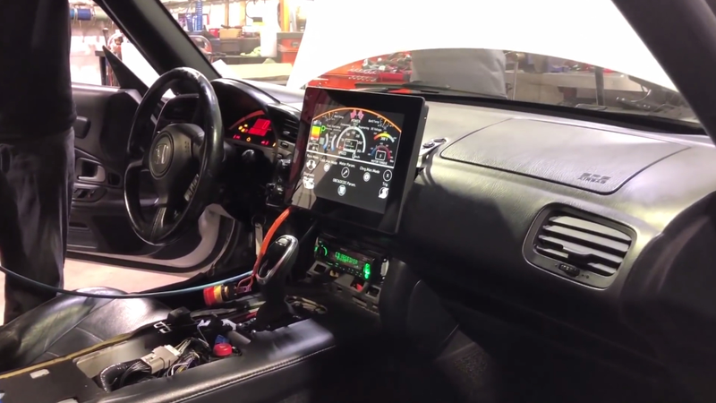 A central touchscreen allows access to all the car’s vital functions.